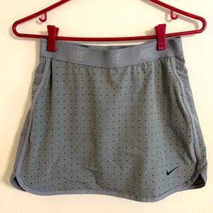 NIKE dri-fit skort. Grey. Size Medium. New without tags.